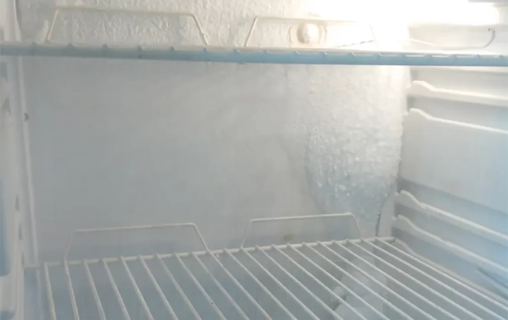 ice on back wall of fridge